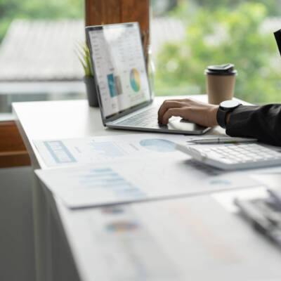 Bookkeeper or financial inspector hands making report, calculating. Home finances, investment, economy, saving money or insurance concept